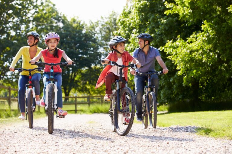 Family on bikes at Montmorency Falls
